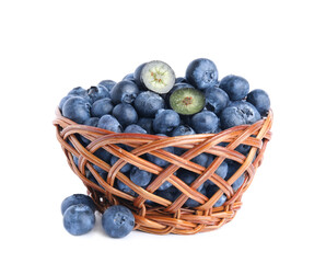 Fresh tasty blueberries in wicker basket isolated on white