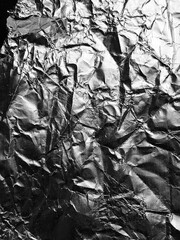Surface of aluminium foil texture for background and design materials.