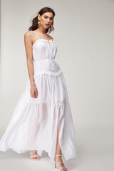 Beautiful woman fashion model makeup brunette hair perfect body shape tanned skin wear clothes...