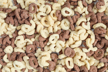 Numbers shaped cornflakes. Black and white chocolate cereals. 