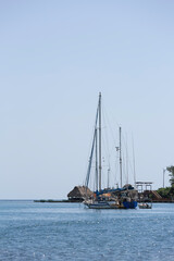 Fototapeta premium Sailboat on a Caribbean Coast