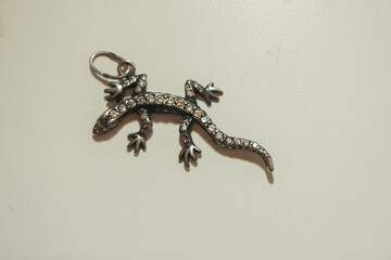 Silver set of earrings and rings with natural red garnet stone, pendant in the shape of a lizard...