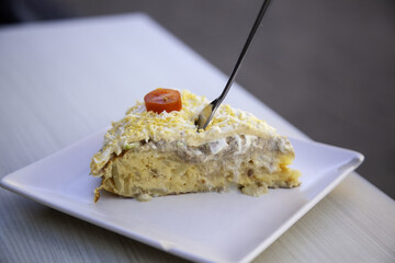 Omelette skewer on a terrace