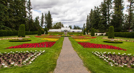 Duncan garden at Manito Park with flowers and cloudy sky