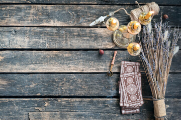 Tarot cards on the old wooden table background.