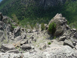 Russia, Lake Baikal. Trekking along Lake Baikal through the mountain. Beautiful views of the largest freshwater lake in the world and mountain view.