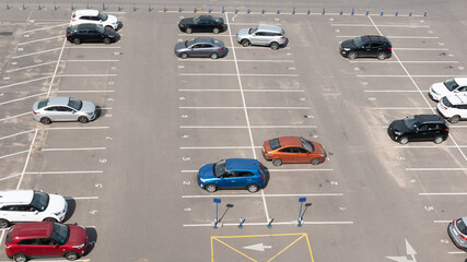 Car parking with numbered spaces. Free places are available.