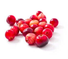 Heap of cranberries isolated on a white background.
