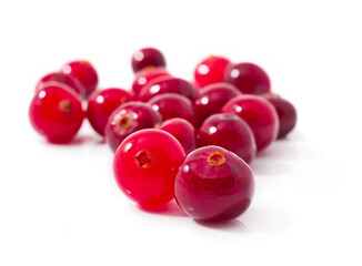 Heap of cranberries isolated on a white background.