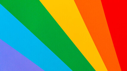 Abstract rainbow background with colored paper. The concept of bright colorful colors. The view from the top