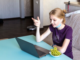 Cheerful woman laugh using laptop video stream conference call teach online, happy ethnic girl student gamer tutor have fun watch webinar web cam education entertainment concept.