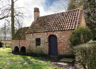 Fototapeta na wymiar historical farmhouse in a rural landscape, Bokrijk, Belgium