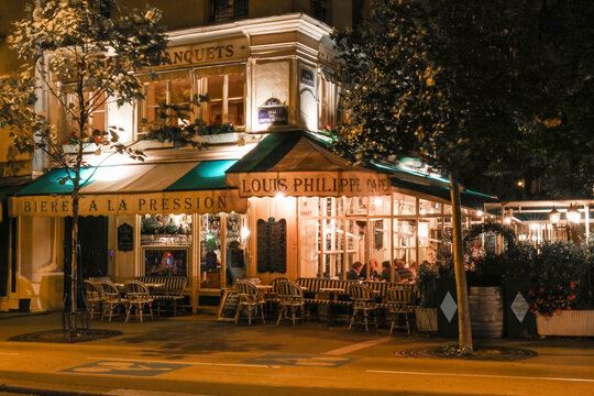 Paris, France-September 09,2017: The cafe Louis Philippe situated in a busy corner of the Marais, just at the end of Pont Louis Philippe, is what is possibly the most adorable cafe in all of Paris.