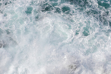 Wall mural on the marine theme. Seascape for the interior. White sea foam. The turquoise color of the waves. Stormy Bay of Biscay. The texture of the waves. Spray and the power of the sea.