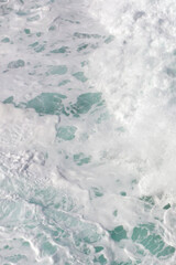 Wall mural on the marine theme. Seascape for the interior. White sea foam. The turquoise color of the waves. Stormy Bay of Biscay. The texture of the waves. Spray and the power of the sea.