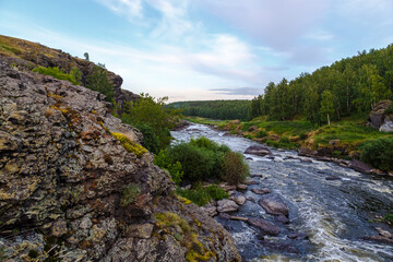Many rapids with waterfalls, spray foam and whirlpools close-up, rotate camera. Ural region,...