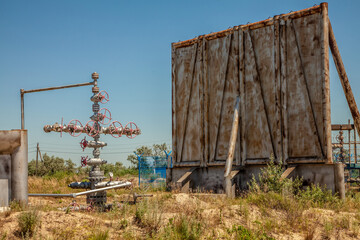 Oil field scene, oil pipelines and facilities