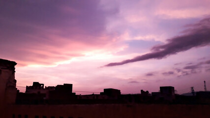 Fototapeta na wymiar An Image of Purple clouds in a Purple Sky During Sunset