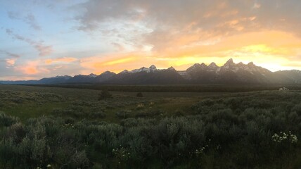 Panorama Vivid and Colorful Grand Teton Mountain Sunset