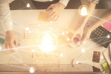 Double exposure of man and woman working together and social network theme hologram drawing. Computer background. connecting concept. Top View.