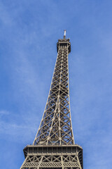Eiffel Tower (La Tour Eiffel) located on Champ de Mars in Paris, named after engineer Gustave Eiffel. Eiffel Tower is tallest structure in Paris and most visited monument in world. Paris, France.