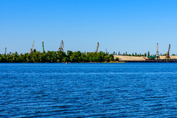 Heavy cranes at the cargo port in Kremenchug, Ukraine