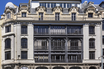 Naklejka premium Old French house with traditional balconies and windows. Paris, France.