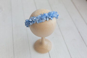 children's bandage made of hydrangeas. flower wreath for a girl. hat of artificial flowers