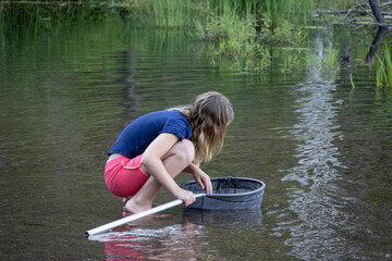young girl with fishing net