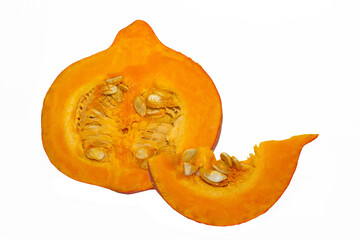 Ripe orange pumpkin and slices isolated on a white background