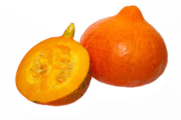 Ripe orange pumpkin and slices isolated on a white background