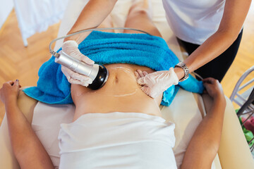Cavitation RF body treatment and contemporary medicine for health beauty improvement and fat and...
