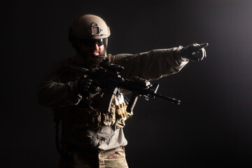 military special forces in uniform with weapons attack at night, elite troops, counter-terrorist...