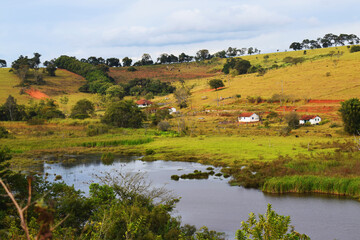 Southeast Brazil rural landscape with lake.