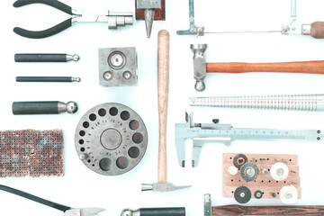Tools set of jewellery. Jewelry workplace on metal background with copy space for text. Top view isolated.