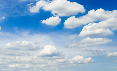 beautiful blue sky and white fluffy cloud horizon outdoor for background.