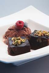 Brownies served with chocolate ice cream