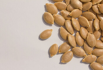 close up Sweet pumpkin seeds isolated white background.
