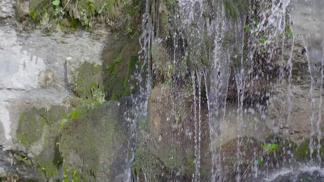 A waterfall caming out of a cave at Afka, Lebanon. Slow motion
