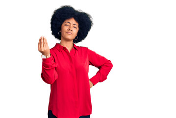 Young african american girl wearing casual clothes doing italian gesture with hand and fingers confident expression