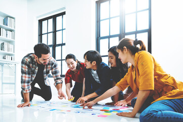 Group of young business people team and designers. They are working on new project. Startup entrepreneur multi ethnic diverse person