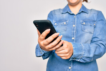Young caucasian woman having conversation using smartphone over isolated white background
