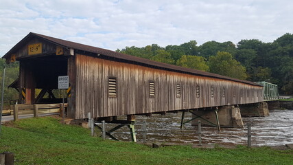 Fototapeta na wymiar old wooden covered bridge