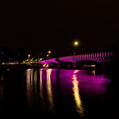 Bridge on water in Melbourne at night