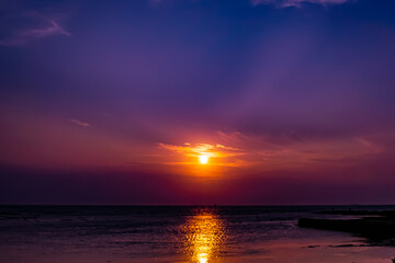 Fototapeta na wymiar Sunset with purple orange sky