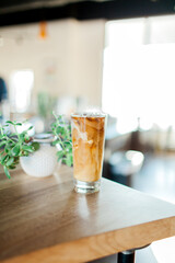 Iced Americano on Wood Table