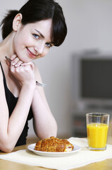 Woman having breakfast