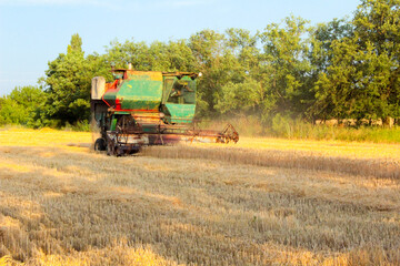 combine harvester working on a field