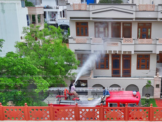 Sanitization of houses using fire trucks 