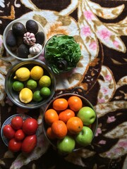 Winter fruits (Avocado, Lemon, Lime, Tomatos, Mandarins, Apples, Spinach, Garlic)